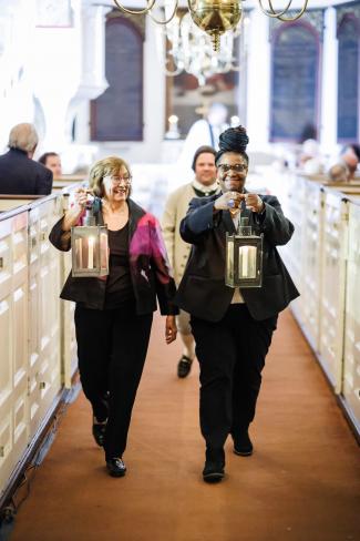 Lantern bearers Anne Sheetz and Nyasha Toyloy