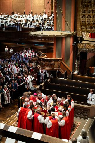 Bishops laying hands on Bishop-elect Whitworth 