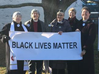 arlington clergy with banner 