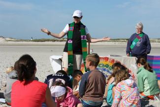 Mass on the sandbar