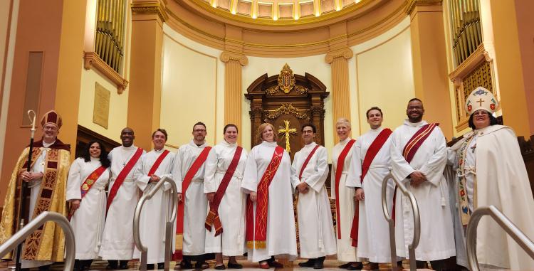 Newly ordained deacons pictured with bishops