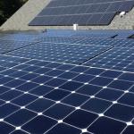 Bishop Bud Cederholm blesses solar panels at Grace Church Medford 